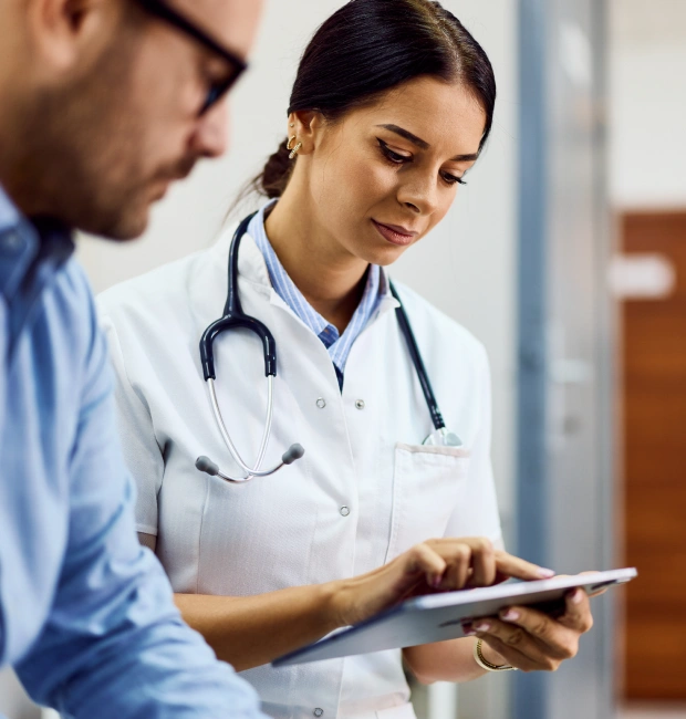Healthcare professional reviewing regulatory documents